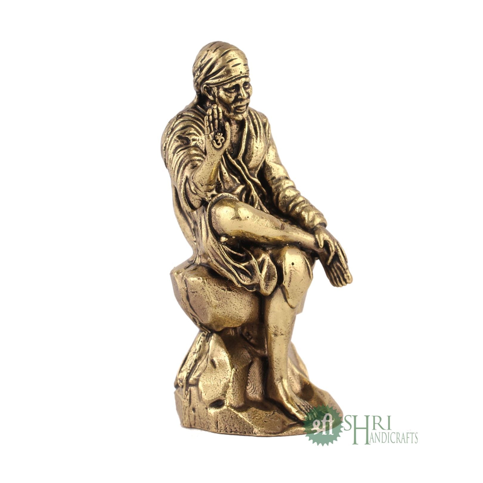 6" BRASS SAI BABA SITTING ON STONE