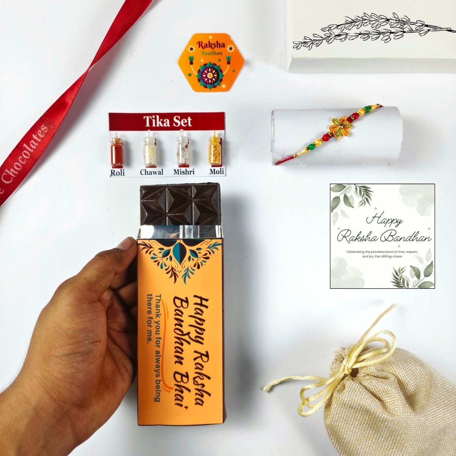 Rakhi Gift Set For Brother With 35G Chocolate Bar, Greeting Card, Jute Potli And Tika Set |Unique Raksha Bandhan Gift For