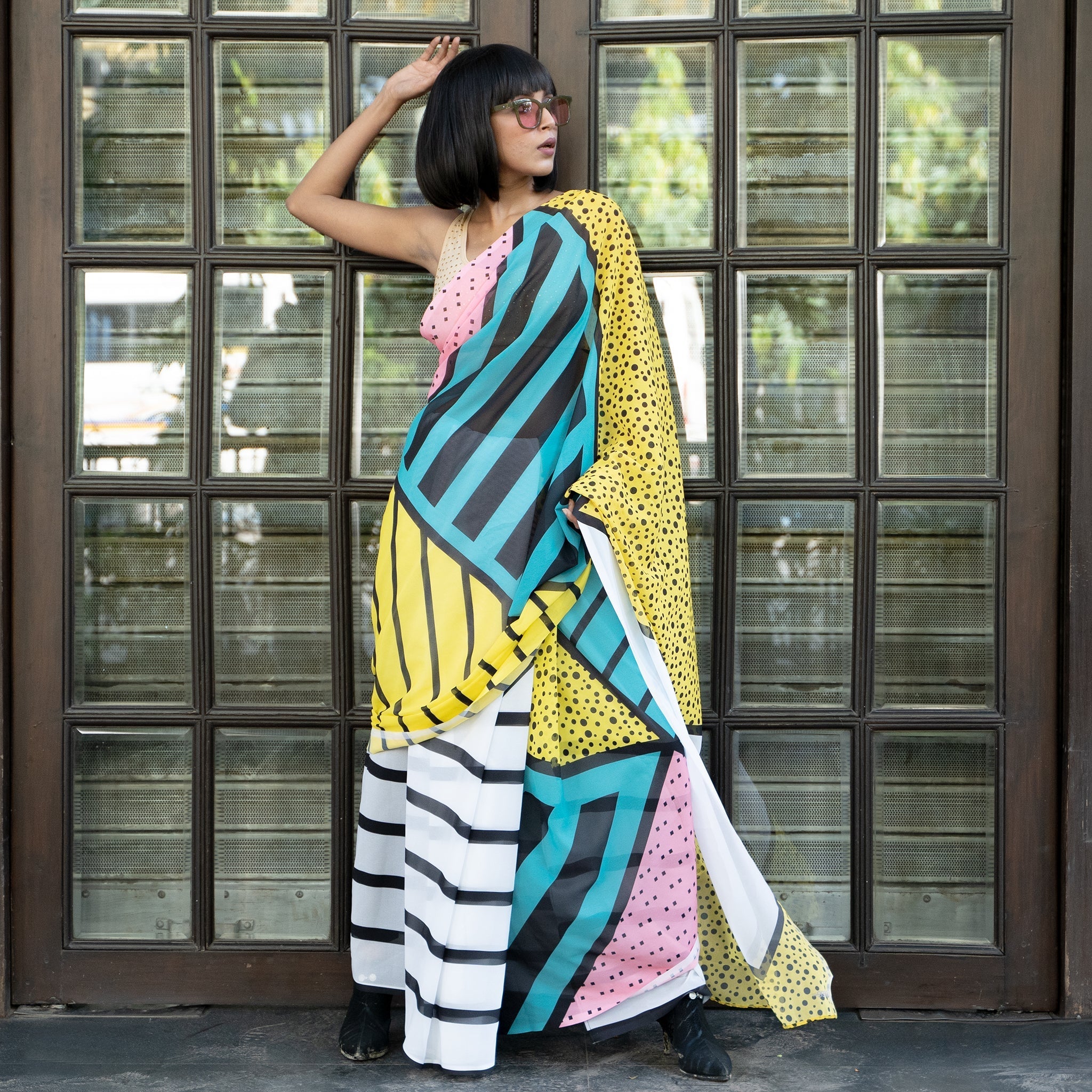 Women's Yellow And Blue Brew With Black Digital Printed Satin Georgette Saree